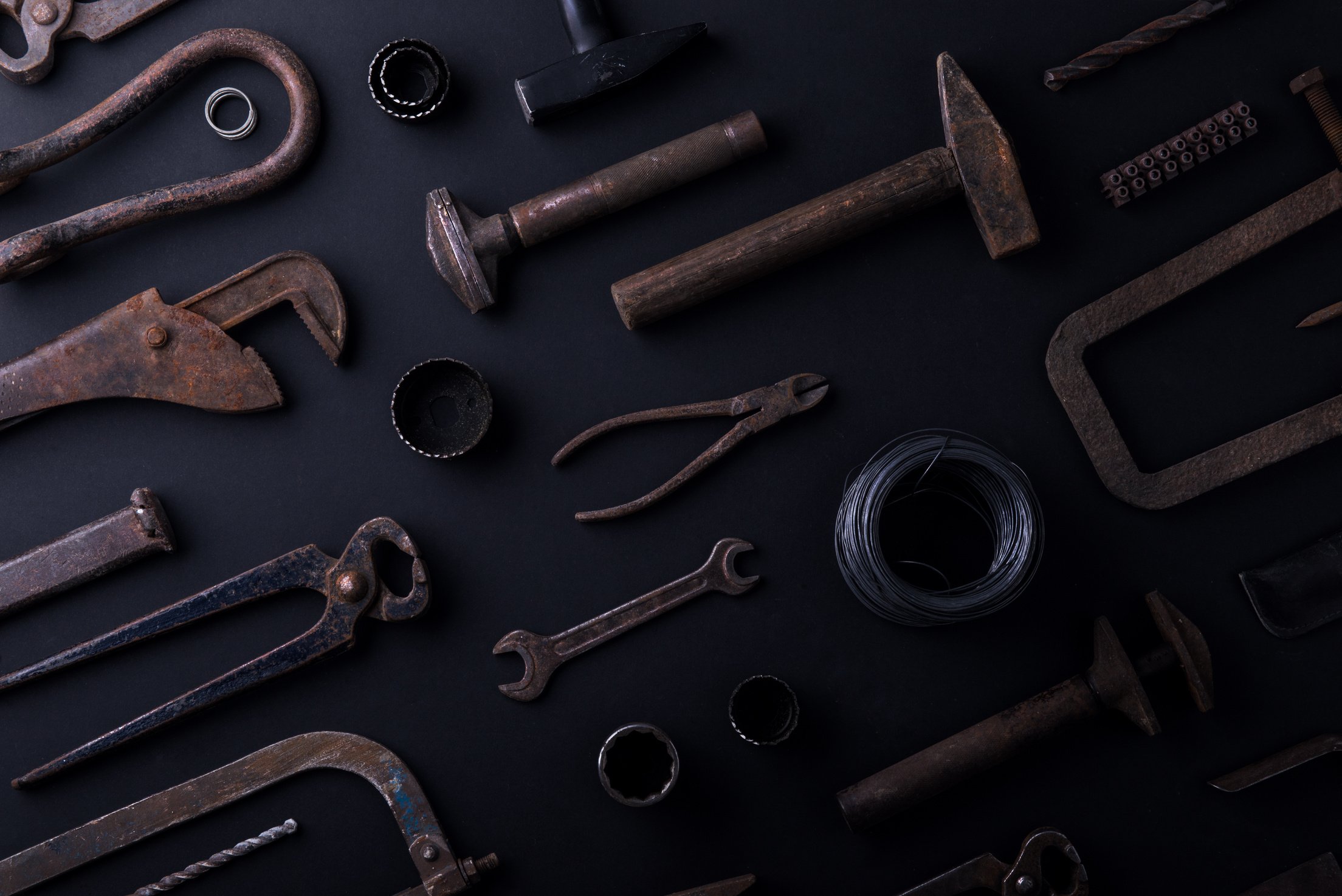 Rusty Tools on Dark Background